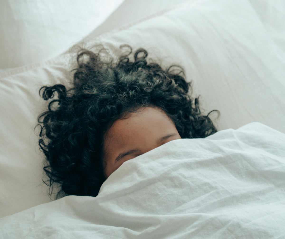 black woman with cover until her forehead